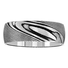 a wedding band with black and white stripes