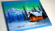 a painting of a cabin in the snow with mountains and trees painted on it's sides