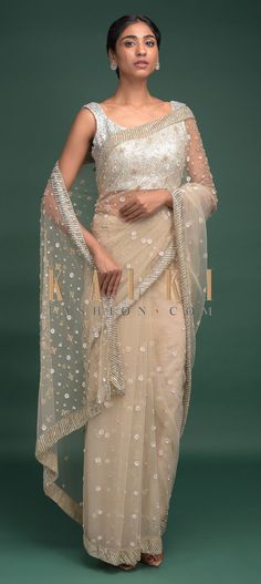 Buy Online from the link below. We ship worldwide (Free Shipping over US$100)  Click Anywhere to Tag Hush Beige Saree In Net Adorned With Sequins Embroidered Floral Pattern Online - Kalki Fashion Hush beige saree in net adorned with sequins embroidered floral pattern.Border enhanced with sequins and cut dana work. Saree Blouse Designs, Blouse Design, Saree Blouse