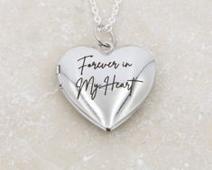 Custom locket heart necklace for mom or gift for wife - perfect Valentine's Day gift! Personalize heart locket with phrase, name, initials, short phrase, design - sky's the limit!  Yes, you can add photos easily to the inside. 100% Stainless Steel for No Tarnishing - upgrade Chain to Sterling Silver or 14K Gold/Rose Gold Filled in dropdown. We offer lots of fonts, chain lengths, and designs - see Photos for Options. More Lockets- https://www.etsy.com/shop/DistinctlyIvy?ref=l2-shopheader-name&sea Personalized Heart Charm Necklace For Memorial, Engraved Heart Necklace For Valentine's Day Memorial, Engraved Heart Necklace For Mother's Day Memorial, Open Heart Charm Necklace For Mother's Day Keepsake, Heart Pendant Charm Necklace For Mother's Day Memorial, Memorial Heart Locket Necklace For Mother's Day, Mother's Day Keepsake Open Heart Charm Necklace, Personalized Charm Necklace For Valentine's Day Memorial, Engraved Charm Necklace For Valentine's Day Keepsake