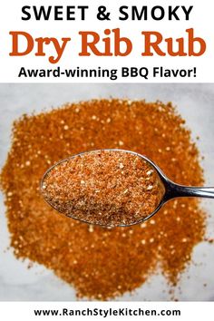 a spoon full of dry rub on top of a white surface with the words sweet & smoky dry rub