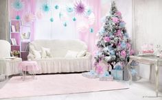 a living room decorated for christmas with pink and blue decorations on the walls, white furniture and a tree