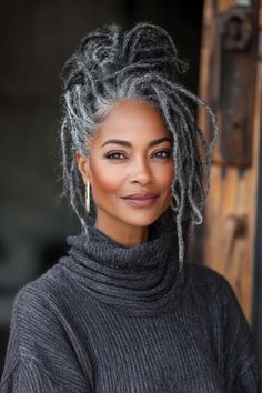 Click for More ➡️ | Save for Later ❤️  Locs are a beautiful and low-maintenance option for older women. A charcoal hue with a deep side part adds depth and sophistication, perfect for Black women embracing their natural beauty. (Locs in Charcoal with Side Part - Hairstyles For Older Women) Women With Grey Hair, Dreads Updo Styles Black Women, Hair For Older Women, Updo Styles For Locs, Grey Braids, Grey Braids For Black Women, Grey Locs Black Women, Long Loc Styles Women Updo