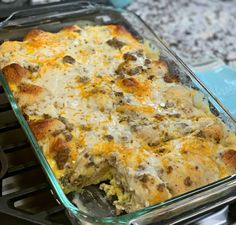 a casserole dish with meat and cheese in it