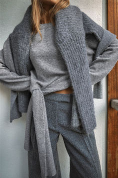 Knitted Tie Detail Sweater Gray Sweater For Layering With Soft Texture, Gray Crew Neck Sweater With Soft Texture, Gray Soft Knit Crew Neck Outerwear, Gray Ribbed Sweater For Winter, Gray Ribbed Sweater For Layering, Gray Winter Tops With Soft Texture, Gray Soft Texture Tops For Winter, Gray Soft Texture Winter Tops, Gray Ribbed Cardigan For Fall