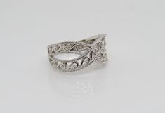 Vintage Sterling Silver Filigree Ring ...Marked 925...Weights 3.4grams...Size 8...Measure of Face 9.8MM...It's in very good condition. B Sterling Silver Rings With Decorative Band, Elegant Sterling Silver Filigree Ring With Decorative Band, Elegant Sterling Silver Engraved Open Band Ring, Elegant Engraved Ring Stamped 925, Anniversary Sterling Silver Filigree Ring With Decorative Band, Formal Sterling Silver Engraved Ring With Decorative Band, Sterling Silver White Gold Filigree Ring, Elegant Stackable Wedding Rings Stamped 925, Elegant Sterling Silver Stackable Wedding Rings