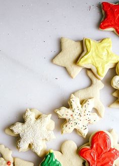 several decorated cookies sitting on top of a table