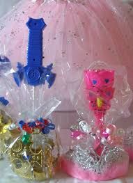 there are three plastic toys in the shape of princess crowns and tiaras on display