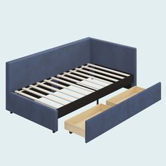 the bed frame has two drawers underneath it and is made from blue fabric with wooden slats