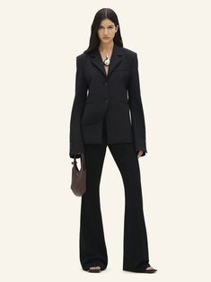 MODULAR WOOL TAILORED JACKET - courrèges Tailored Designer Long Sleeve Blazer, Designer Tailored Long Sleeve Blazer, Modern Blazer With Structured Boning And Long Sleeves, Modern Long Sleeve Blazer With Structured Boning, Long Sleeve Blazer With Pressed Crease For Fall, Luxury Structured Suit For Fall, Luxury Structured Suits For Fall, Tailored Structured Fall Blazer, Tailored Fall Suit With Structured Boning