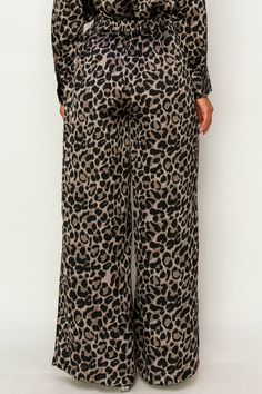 • SKU: P-2108• S-M-L• Hand wash only• Roar with fashion-forward style in our Cheetah High-Waisted Gaucho Pants. Embrace the fierce and fabulous look of cheetah print while enjoying the comfort and flattering fit of the high-waisted gaucho design - perfect for making a bold statement wherever you go.