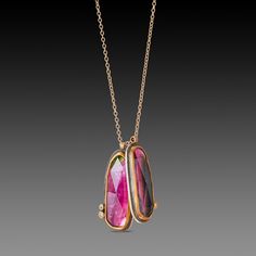 A luminous and vibrant pair of watermelon tourmalines, accented with tiny diamonds, float freely together on a delicate 14k gold chain in this lovely necklace. Each lovely gem is wrapped in 22k gold and backed with sterling silver. Pendants measure approximately 1/4 inch and 7/8 inch tall. Matte finish. This piece is in stock and ready to ship. Watermelon Tourmaline Necklace, Jewelry Beauty, Gemstone Necklaces, Tourmaline Pendant, Green Jewelry, Tourmaline Necklace, Tiny Diamond, Watermelon Tourmaline, Lovely Necklace