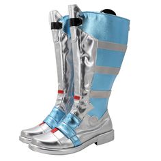 a pair of silver and blue boots with straps