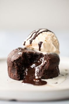 a piece of chocolate cake with ice cream on top