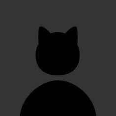 the silhouette of a cat's head against a dark background