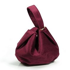 Women Clutch Velvet Top Handle Bag Wristlet Small Tote Purse (Burgundy) A Stylish Top Handle Bag for Night Out, a slouchy bucket shape clutch,embellished with a charming Loop of handle,Ideal for carrying in-hand as a wristlet cluch. This Clutch made with Velvet fabric that looks even glossier under spotlights,soft touch and luxury look. Unique Design,the handles tuck into each other instead of the usual fastener.it closes by threading one handle through the gold polished loop. additional a magnetic snap to add securely for your belongings. Size at 9.4‘’L x 6.3‘’W x 7.8‘’H; There is plenty of room to fit long wallet, phone, cardholder and the essentials. Playful novelty bags,statement wristlet，Wear it to inject some color into neutral outfits.Perfect for all kinds of party, wedding,vacation Tan Clutch, Envelope Purse, Printed Clutch, Stylish Top, Novelty Bags, Evening Purse, Velvet Top, Beaded Clutch, Wristlet Clutch