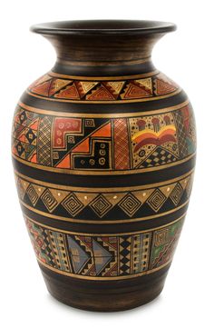 a large vase with designs painted on it