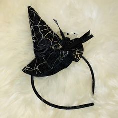 This Black With Silver Cobweb Pattern Witch’s Hat Headband Is New In Bag & Is The Perfect Easy Instant Halloween Costume! Headband Will Fit Either Kids Or Women - Very Versatile! It’s Ready For Your Halloween Adventures! Please Ask All Questions Before Purchase. All Items Are Recorded While Packing Up For Shipping, For Transparency And To Prevent Any Misunderstandings. Inventory #Hol1292720a Witch Hat Headband, Witch Headband, Diamond Headband, Designer Eyeglass Frames, Womens Cosplay, Halloween Adventure, Round Metal Sunglasses, Hat Headband, Crystal Hair Accessories