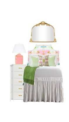 a white bed sitting under a mirror next to a nightstand with a lamp on top of it