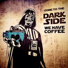 a darth vader poster painted on the side of a wall with words come to the dark side we have coffee