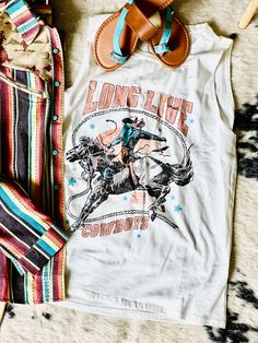 Cowboys will always be our favorite! Distressed tank top, that fits like your favorite tee. True to size! Cotton Racerback Muscle Tee With Graphic Print, White Casual Racerback Muscle Tee, Casual White Racerback Muscle Tee, Casual Soft-washed Sleeveless Muscle Tee, Fun White Tank Top, White Graphic Print Tank Top, Spring Graphic Sleeveless Tank Top, Spring Graphic Tank Top, Spring Sleeveless Graphic Tank Top