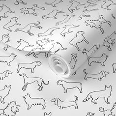 a wallpaper with black and white dog silhouettes on it's back ground