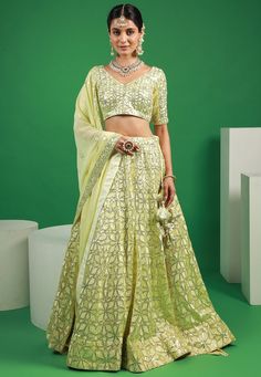 Readymade Embroidered Faux Georgette Lehenga in Off-White This attire with Cotton Lining is Enhanced with Resham and Sequins Work. Crafted in Sweetheart Neck and Half Sleeve Available with a Faux Georgette Choli and a Faux Georgette Dupatta in Off-White The Choli and Lehenga Length are 12 to 15 and 42 inches respectively Do note: Accessories shown in the image are for presentation purposes only.(Slight variation in actual color vs. image is possible). We sell all kinds of Lehenga and Chaniya Cho Casual Lehenga, Lehenga Sangeet, Gujarati Chaniya Choli, Indowestern Lehenga, Bridesmaid Dresses Indian, Sequin Lehenga, Pakistani Lehenga, Indian Bridesmaid Dresses, Mirror Work Lehenga