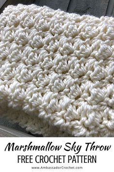 a crocheted blanket with text overlay that reads, marshmallow sky throw free crochet pattern