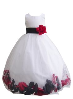 a white dress with red and black flowers on it