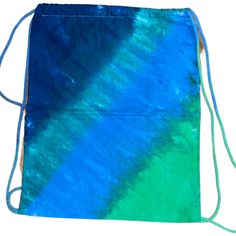 a blue and green tie - dyed drawsack bag on a white background with a string