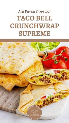 an image of taco bell crunchwrap supreme with tomatoes and lettuce