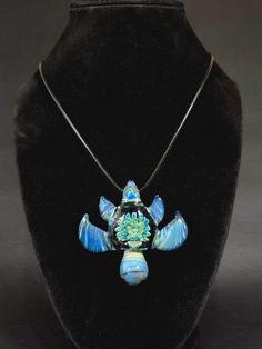 Sea Turtle - Blue Thunder   Includes FREE SHIPPING in North America. Each Blue Thunder turtle is made to order and will be created just for you! The piece received will have slight variations from the one shown in the photo, making each one completely unique. When we receive your order, Kyle will hand make your one-of-a kind Blue Thunder turtle with clear and colored borosilicate glass. Comes with a 2mm waxed polyester necklace cord 45cm in length with a lobster claw clasp and 5cm extension chai Adjustable Blue Jewelry With Artistic Design, Artisan Hand Painted Blue Necklaces, Artisan Blue Hand Painted Necklaces, Artistic Blue Jewelry With Large Pendant, Artisan Hand Painted Blue Necklace, Artisan Blue Necklace With Artistic Design, Unique Hand Painted Blue Necklace, Artistic Hand Painted Blue Jewelry, Unique Blue Hand Painted Necklace