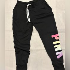 Nwt Size M, Super Soft, Victoria's Secret Pink Everyday Lounge Skinny Jogger Color Black Rainbow Everyday Lounge Skinny Jogger Slim-Tapered Fit Adjustable Drawstring Waistband Ribbed Banded Bottom Side Pockets Stretch Pink Pants With Drawstring, Pink Stretch Pants With Drawstring, Pink Stretch Trendy Joggers, Trendy Stretch Pink Joggers, Trendy Pink Stretch Joggers, Trendy Pink Sweatpants With Drawstring, Pink Athleisure Joggers With Drawstring, Trendy Pink Drawstring Pants, Pink Fitted Joggers For Loungewear