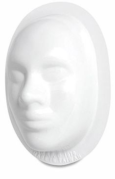 a white mannequin's head on a white background