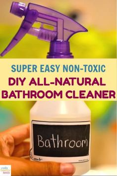 a hand holding a bottle with the words diy all natural bathroom cleaner on it