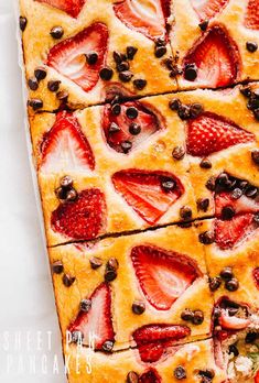 sliced strawberries and chocolate chip cookie bars on a white surface with text overlay