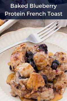 A healthy breakfast, protein powder recipe featuring a french toast casserole covered in syrup and blueberries. French Toast With Protein Powder, Healthy Sweet Breakfast Casserole, Blueberry Protein Powder Recipes, Protein French Toast Meal Prep, Macro Friendly French Toast Casserole, Protein Breakfast Recipes On The Go, Healthy Breakfast Crockpot, High Protein Meals Lunch Ideas, French Toast Recipe Protein