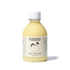 a bottle of yuzuco juice on a white background