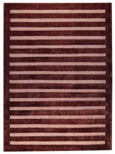 a brown and white rug with horizontal stripes