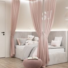 a white and pink bedroom with teddy bears on the bed, curtains, and pillows