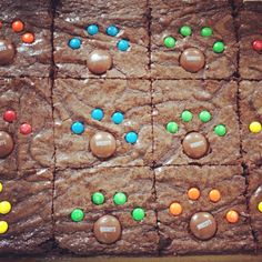 a chocolate cookie with m & m candies on it