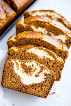 slices of pumpkin bread with cream cheese frosting