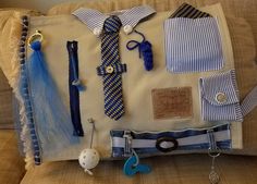 an assortment of ties laid out on a pillow