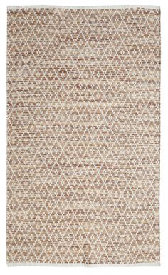 a brown and white rug on a white background