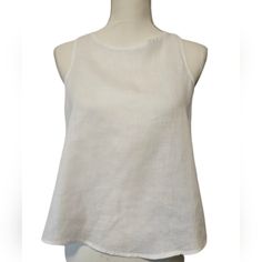 Isaac Mizrahi White Linen Sleeveless Top Women's Size Xs Nwot New Without Tags, 100% Linen Top, A Flowy Flap Back, Beautiful For A Summer Night, Beach Vacation Or Casual Day Out. R50 Sleeveless Linen Summer Vest, Fitted Sleeveless Summer Vest, Fitted Sleeveless Vest For Vacation, Sleeveless Linen Tank Top For Summer, Sleeveless Linen Tank Top For Beach, White Linen Sleeveless Vest, Summer Sleeveless Linen Tank Top, Summer Linen Sleeveless Tank Top, White Linen Cami Tank Top