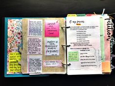 an open planner book with notes and stickers on the pages that have been altered