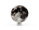 a black and white image of the moon on a bottle stopper, with silver metal fittings