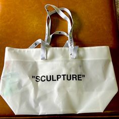 Off-White Virgil Abloh Oversized Tote “Sculpture” Text In Front Purchased From Nordstrom Never Used But Some Wear Overall (See Pics) Two Sets Of Handlesa Short Pair For Handheld Carry, And A Longer Pair That Slips Over The Shoulder Open Top Top Carry Handles; Shoulder Straps Interior Zip Pocket Textile Lining Textile 24 W, 14h 8 D Has Some Condition Issues From Storage Only Large White Luxury Bag, White Sculpture, Off White Virgil Abloh, Off White Virgil, Off White Bag, City Tote Bag, Canvas Leather Tote, White Crossbody Bag, Monogram Tote Bags