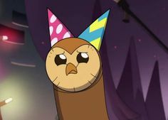 an owl with a party hat on its head