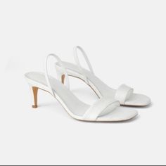 Genuine Zara New With Tag, Euro Size 39 Material: Leather Upper Color(S): White Heel Height About 3 Inches Love Elastic Heel Straps.. So Elegant And Simple White Round Toe Slingback Sandals For Party, White Slingback Sandals For Party With Round Toe, White Pointed Toe Slingback Sandals For Summer, Elegant White Slingback Sandals With Round Toe, Chic White Slingback Sandals With Round Toe, White Padded Heel Slingback Sandals For Summer, Spring Wedding White Slingback Sandals, Spring Wedding Leather Slingback Sandals, White Low Heel Slingback Sandals For Summer